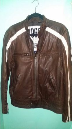Brown leather jacket. .size med mens...great condition!