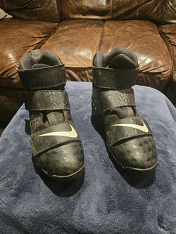 (3) Three used boys baseball cleats
