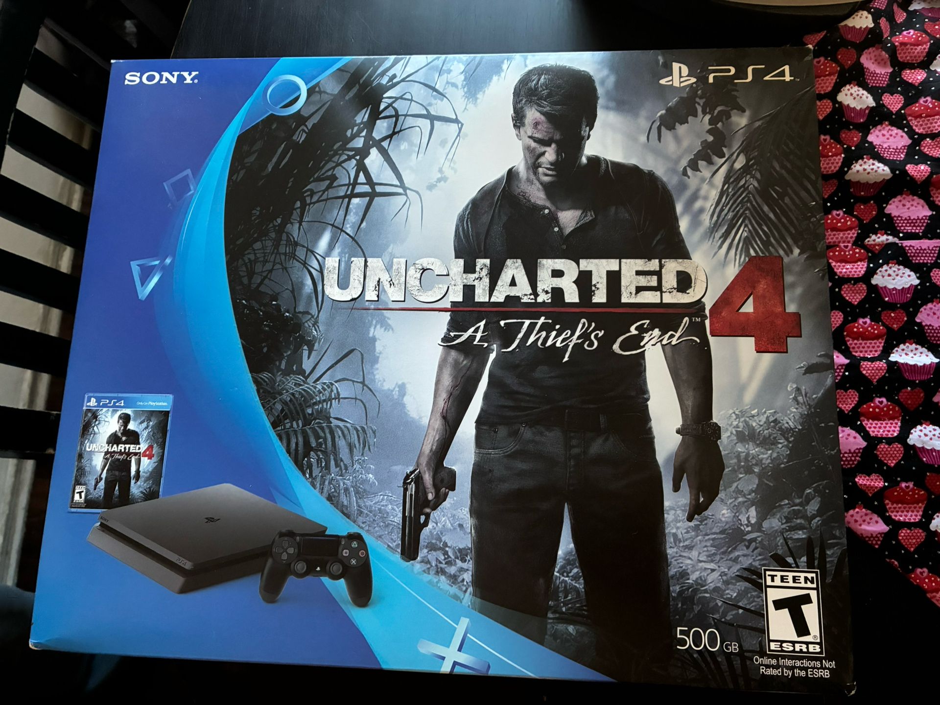 PS4 with Uncharted 4 Game