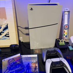 PlayStation with Disc Drive, 2 controllers, and 2 games