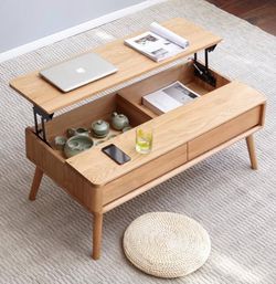 Like new solid wood lifted table with drawers
