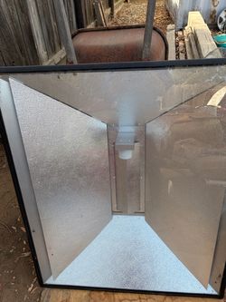 Growing light hood for greenhouse