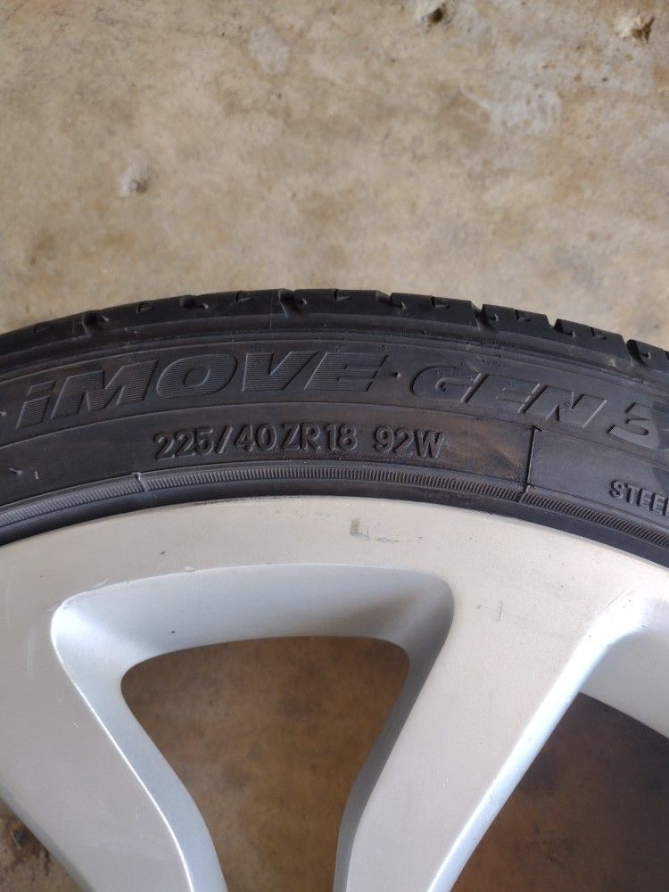 4 Cadillac Rims and 2 Tires