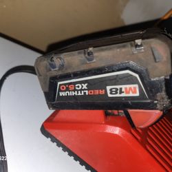 Milwaukee Charger And 3 Batteries 