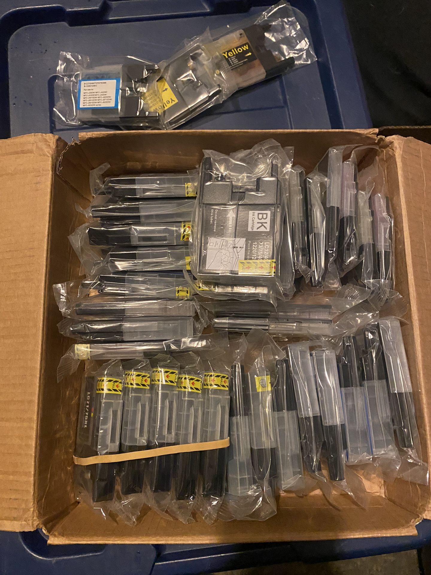 unopened ink cartridges for a Brother printer. The cartridges are compatible with multiple models including MFC-J280W, MFC-J425W, MFC-J430W, MF