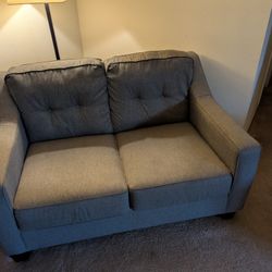 Grey Couch And Love Seat. 