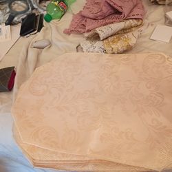 Platemats for the table to eat on four of them firm price pick up only $6 bucks gold color beautiful pick up only 865 Ellsworth avenue right off of Ea