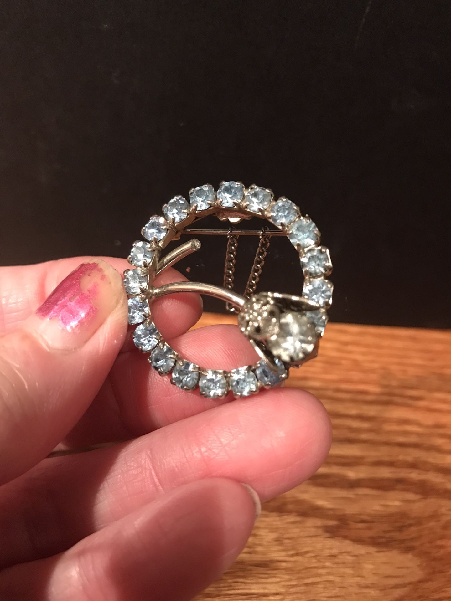 Stunning blue diamond circle brooch
