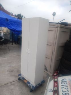 Tall storage cabinet