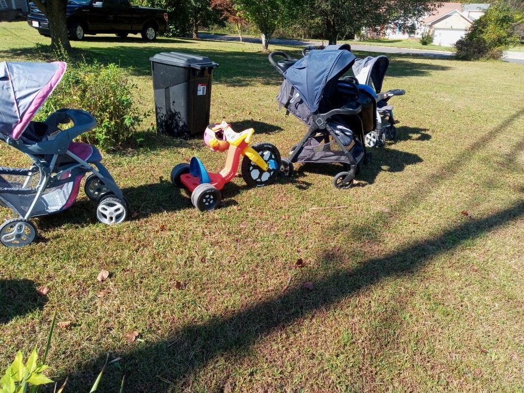 Stroller And Big Wheel 