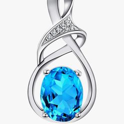 3 Carat Blue Topaz Sterling Silver And CZ Plated 18k White Gold 