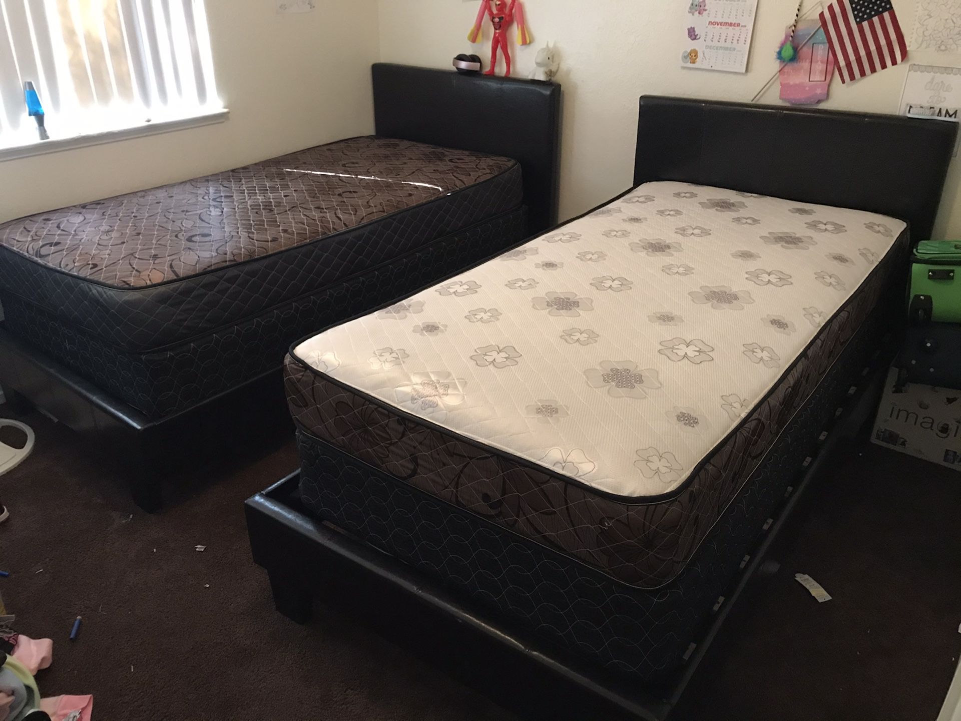 Two twin beds w/mattresses included, w/leather wrap bed frames
