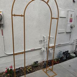 Open Style ARCH stand, size 7.2 ft tall / 4 ft wide. Assembled. New style, gold metal indoor/outdoor