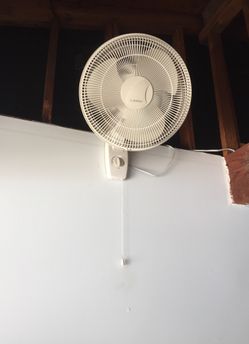 Three speed rotating wall fan