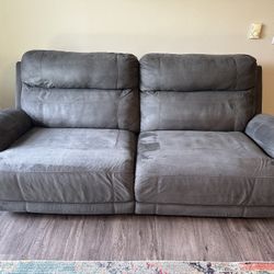 Gray Reclining Sofa *pick-up between 7/19-7/29*