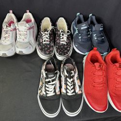 Five pairs of women's shoes.