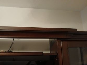 Entertainment center. Not a scratch on it.