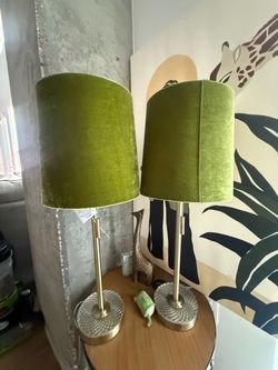 Set a two dollar green velvet and gold table lamps