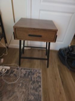Two matching wooden night stands