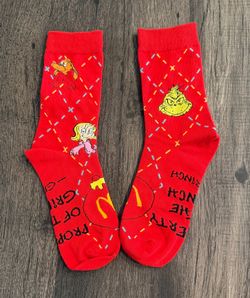 New McDonald’s Grinch red socks from adult Happy Meal.