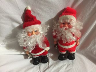 Two 1970’s vintage Santa 9 inch dolls