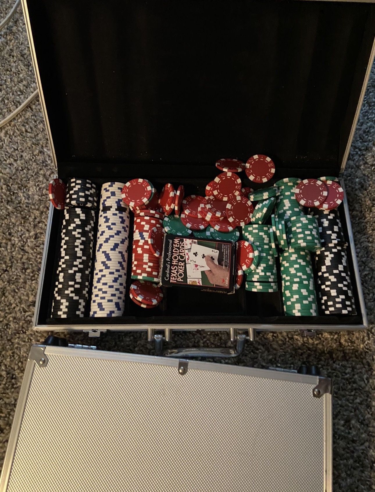 These are real weighed Poker Chip Set With Cards And Cases. 