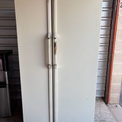 White GE Refrigerator And Freezer