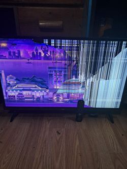 4k ultra HD TCL tv with remote for parts or repairs