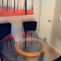 Glass dinning table and 4 chairs