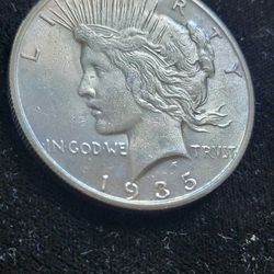 Authentic better date 1935-s U.S. PEACE SILVER DOLLAR in NICE CONDITION 