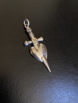 SILVER PIERCED HEART PENDANT