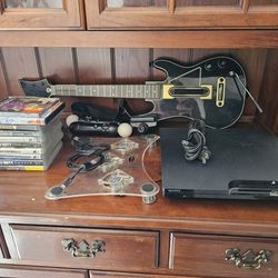 PS3 With Controllers & Games