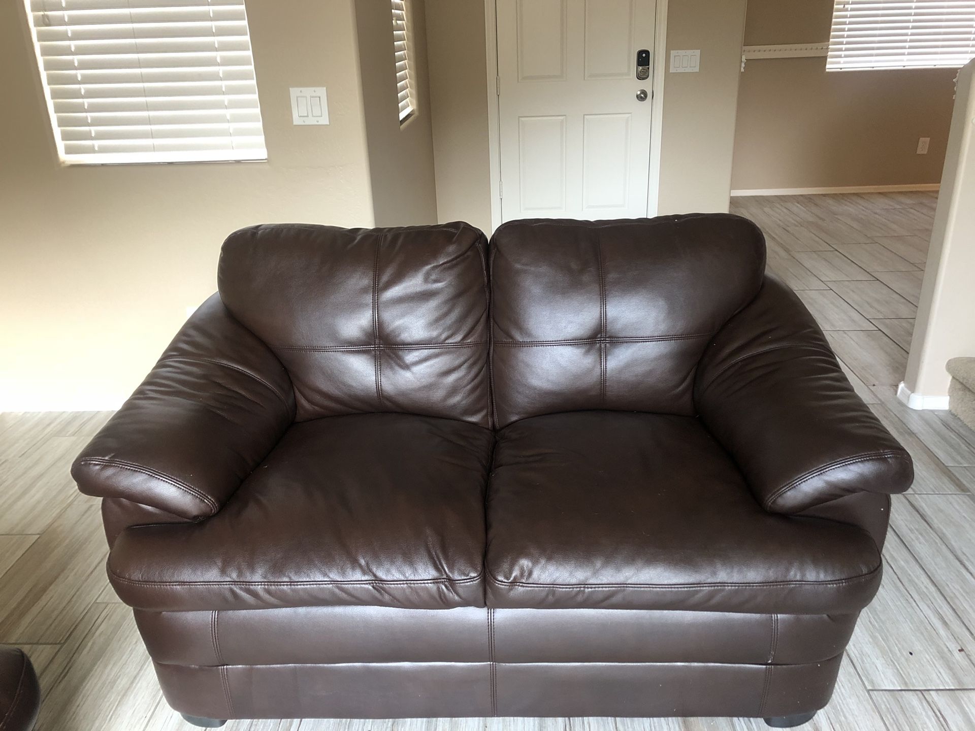 Rooms to Go Two leather brown couches