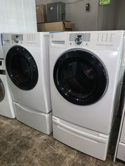 Kenmore Elite front load steam washer & electric dryer set with pedestals in excellent conditions with 4 months warranty