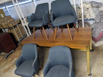 Large dining table with 4 swivel chairs