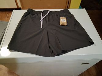 Men's Asics 7 inches shorts size medium brand new all black