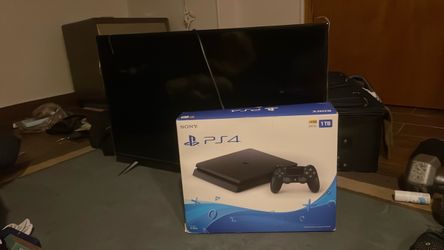 PS4 slim and 4k TV for sale (both in good condition)