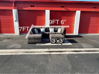 Ashley furniture grey sectional and ottoman