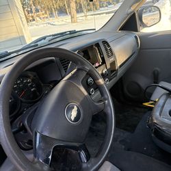 White Chevy work truck