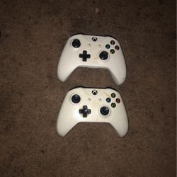 Two white controllers,