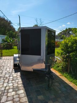 5x8 enclosed trailer setup for detailing or pressure cleaning