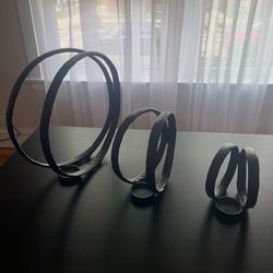 modern sculptural metal candle holders,