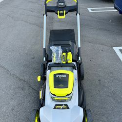 Ryobi Lawn Mower Self Propelled Croos cut . Come w. 1fast charger and 1 6ah Battery (New)