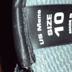 Motorcycle Leathers And Boots Pants And Jacket Zips Together.