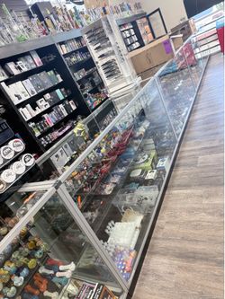 Shelves, glass counter, and Smoke Shop accessory