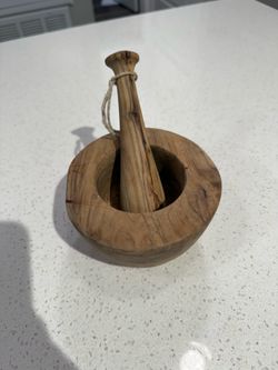 handcrafted rustic olive wood mortar and pestle features a wooden base