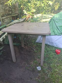Molded plastic outdoor patio table