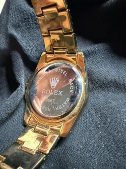 Gold iced Rolex submariner watch