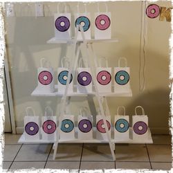 White wood stands for goodie bags