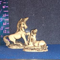 Set Of 2 Hand carved Unicorns 